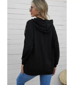 LC usta huppari v-paljeteilla